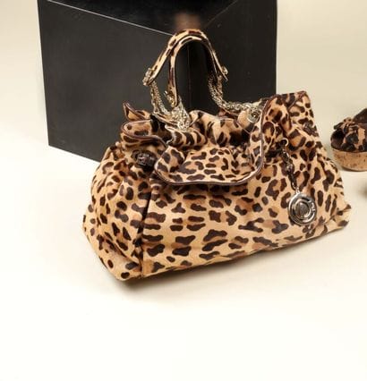 * CHRISTIAN DIOR.
Sac à main Panthère, cuir...