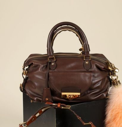 * LOUIS VUITTON.
Sac Louis 34 cm commande...