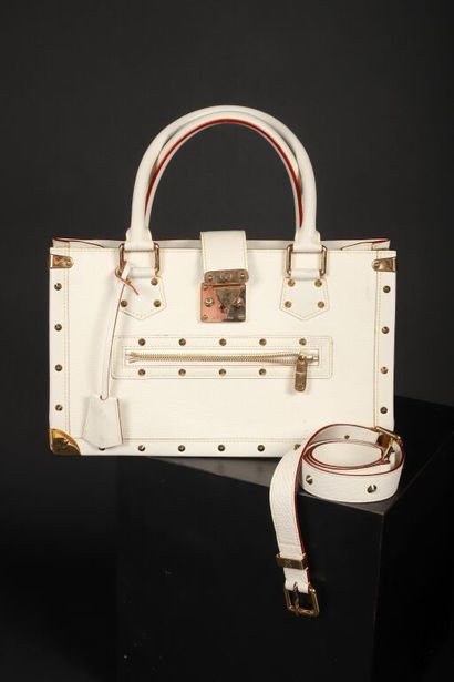 * LOUIS VUITTON par Marc JACOBS.
Lot comprenant...