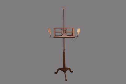 A cherrywood table lamp with an openwork...