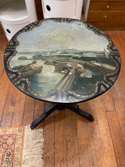 Circular pedestal table in blackened wood,...