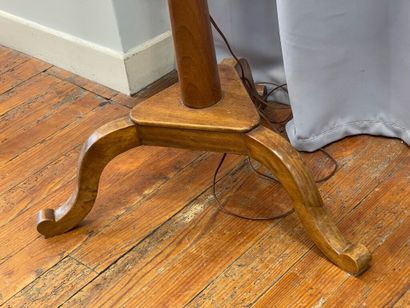 A cherrywood table lamp with an openwork...