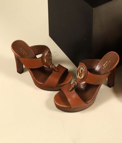 GUCCI.
Pair of gold leather sandals, designer...