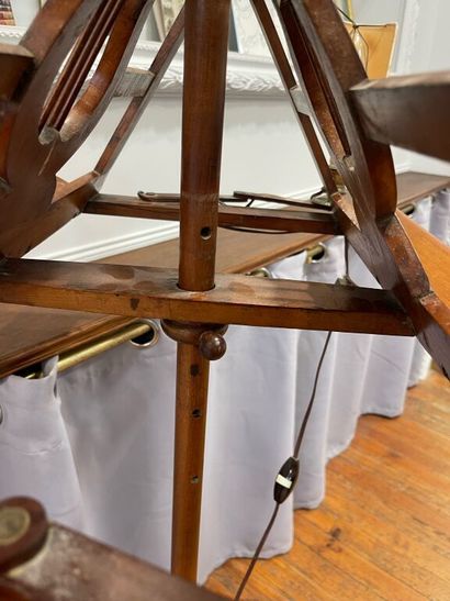 A cherrywood table lamp with an openwork...