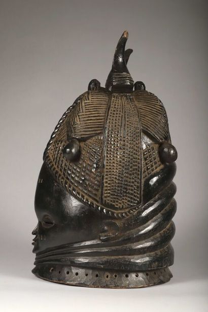 Sowei helmet mask depicting a young woman...