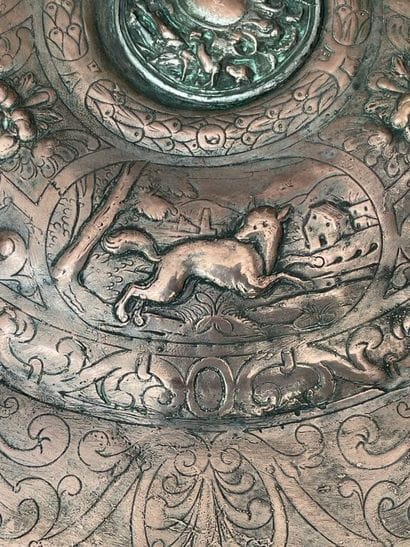 Circular offering dish in old silver-plated...