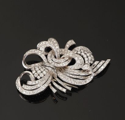 Large radiant corsage brooch in 950‰ platinum...
