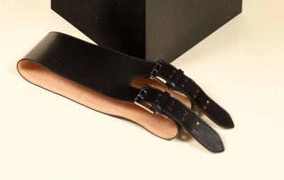 BARBARA BUI.
Wide, high-waisted black leather...