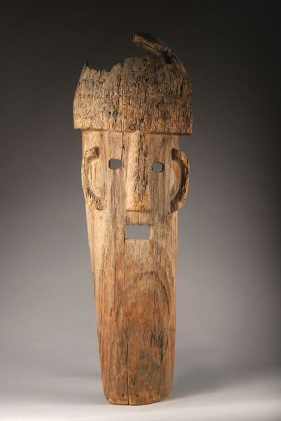 Large and rare mask. Hardwood with faded...