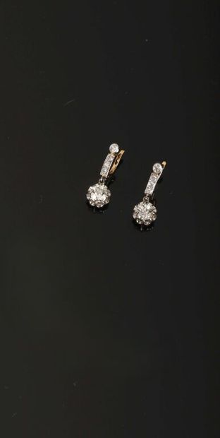 Pair of gold 750‰ and platinum 950‰ dormeuses,...