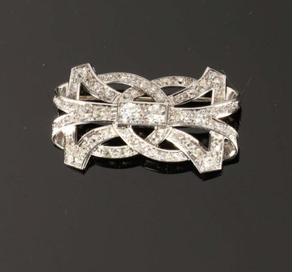 Plate brooch in 750‰ gold and 950‰ platinum...