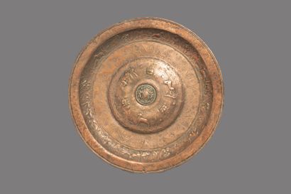 Circular offering dish in old silver-plated...