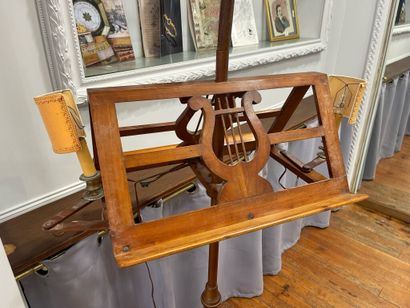 A cherrywood table lamp with an openwork...