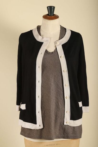 Lot including: 
- PRADA.
Black and white...