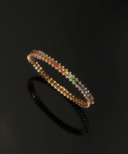 * ALEXANDRA ROSIER. 
Bracelet rigide ouvrant...