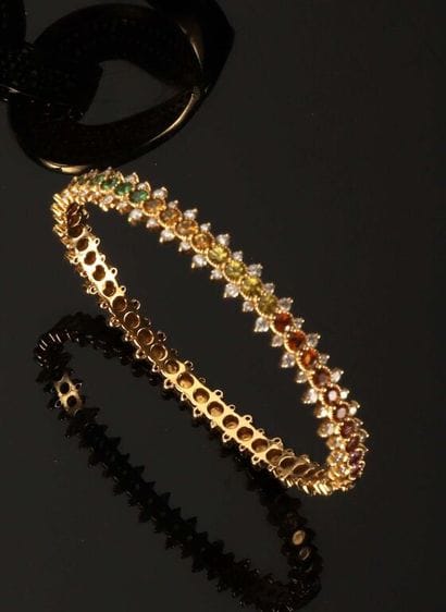 * ALEXANDRA ROSIER.
Bracelet rigide ouvrant...