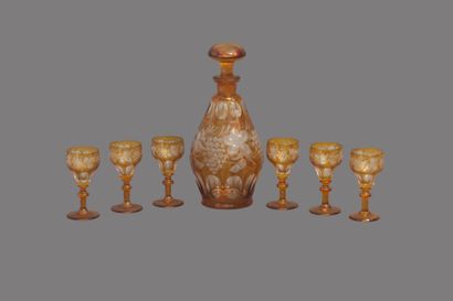 Liqueur service in orange-yellow tinted crystal...