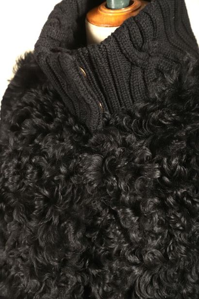 ESCADA.
Sleeveless turtleneck cardigan in...