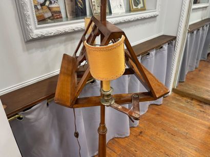A cherrywood table lamp with an openwork...