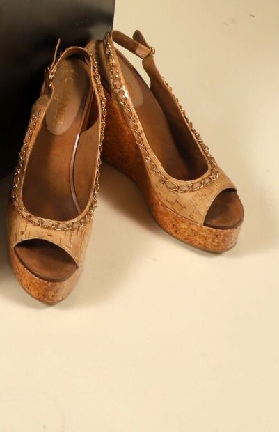 CHANEL.
Pair of open wedges, patent cork...