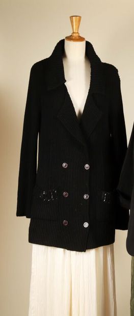 SONIA RYKIEL.
Long cardigan with knit buttons,...