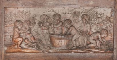 Panneau en bois sculpté en fort relief représentant...