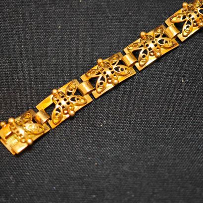 Bracelet articulé en or jaune 750‰ composé...