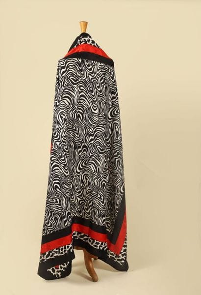 CHRISTIAN DIOR.
Lot comprenant :
-Un foulard...