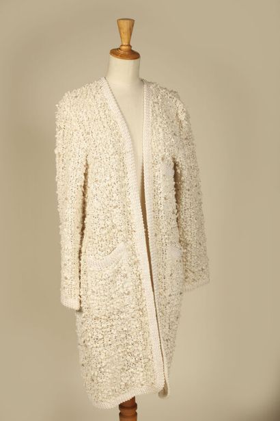 CHRISTIAN DIOR BOUTIQUE.
Cardigan ouvert...