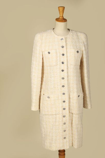 CHANEL BOUTIQUE.
Manteau sans col, tweed...
