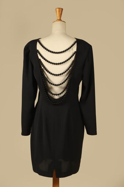 FREDERIC LORCA Paris.
Robe noire dos nu rehaussée...