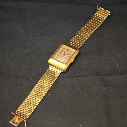LONGINES. Montre-bracelet d'homme en or jaune...