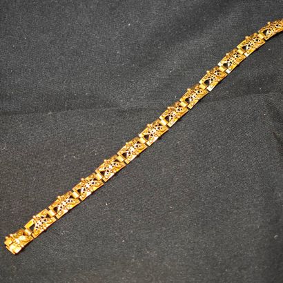 Bracelet articulé en or jaune 750‰ composé...