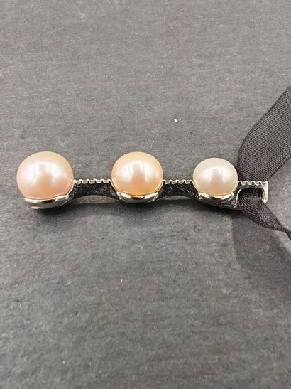 Pendentif en or blanc 750‰, en forme de barrette...