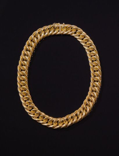 COLLIER gourmette en or jaune 750‰ à maille...