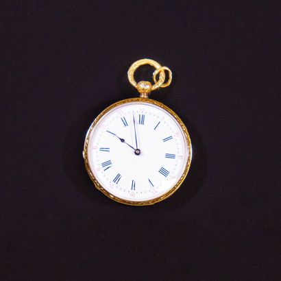 MONTRE de poche en or 585‰ texturé et gravé...
