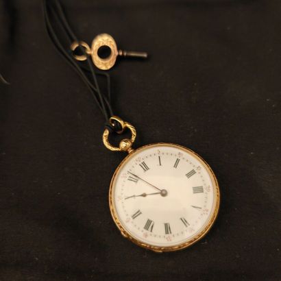 MONTRE de poche en or 585‰ texturé et gravé...