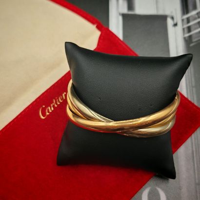 CARTIER, Paris. 1997. Modèle Trinity.
BRACELET...