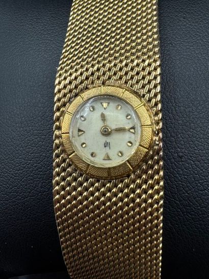 LIP. 
MONTRE-BRACELET de dame en or 750‰,...