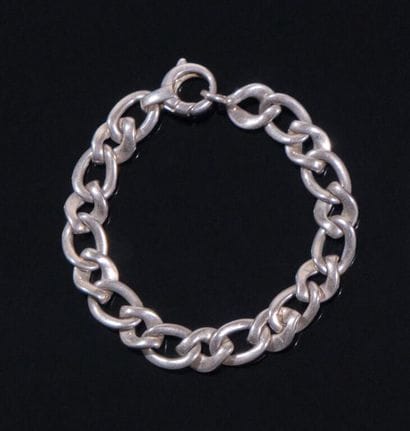 * BRACELET à maille gourmette en argent 800‰.
Long....