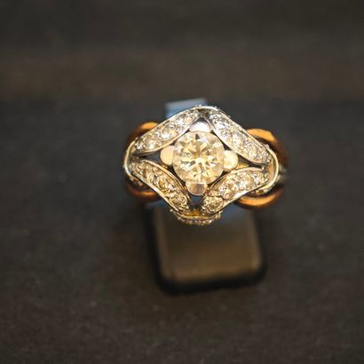 BAGUE pont en or jaune 750‰ et platine 950‰...