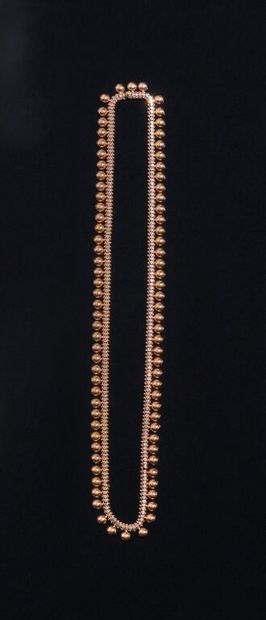 COLLIER souple en or jaune 750‰ composé d'une...