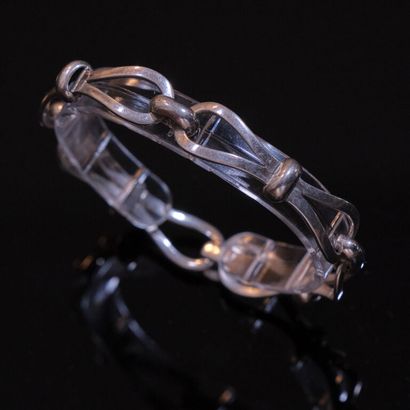 * BRACELET en argent 800‰ à maille nœuds.
Long....