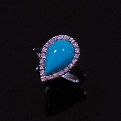 * BAGUE en or 750‰ ornée d'une turquoise...