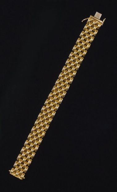 BRACELET en or jaune 750‰ à maille grain...