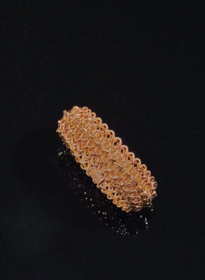 BRACELET en or 750‰ à maille souple texturée...