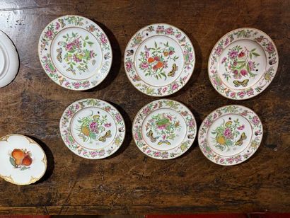 Suite of six porcelain dessert plates with...