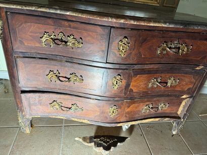 An important chest of drawers with a curved...