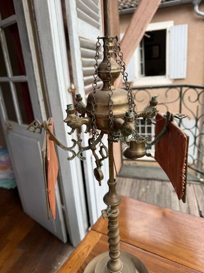 Yellow metal oil lamp with five light arms...