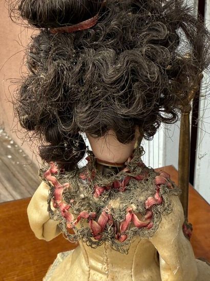 Small harp-playing automaton with bisque...